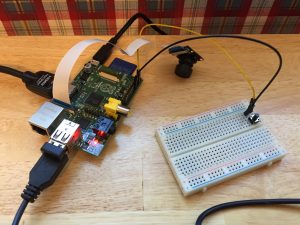 Raspberry Pi with camera and button installed